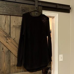 New black sweater smoke free home